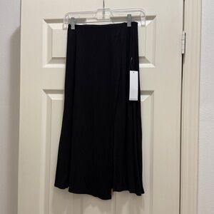 BCBGeneration Vibrant Black  A-Line Slit Skirt with built-in front mini panel XS